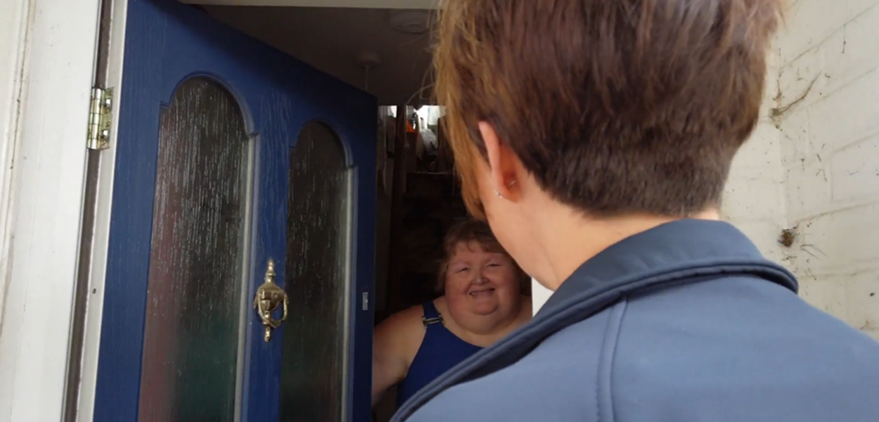 Resident opens door to Tenancy Sustainment Officer 